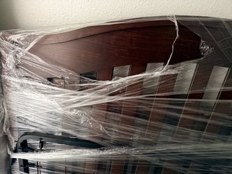 Dark wood crib turn into toddler bed and twin
