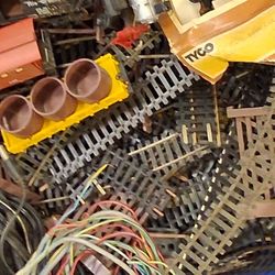 A Box Of Train Tracks & Cars By Tyco