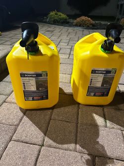 Two 5 Gallon Diesel Cans