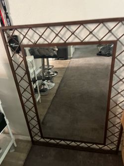 Large copper colored mirror