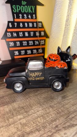 Black Halloween Truck with Pumpkins Decor
