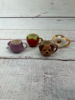 Four Brand new decorative coffee mugs.             Tags cal Coffee mug, cup, thermal Starbucks, dog donut, apple decor, decoration, home garden kitche