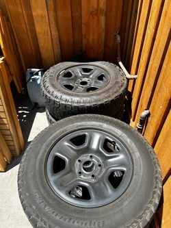 OEM Jeep 17” steel wheels 5 lug