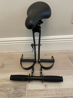 Front mounted children’s bike seat attachment