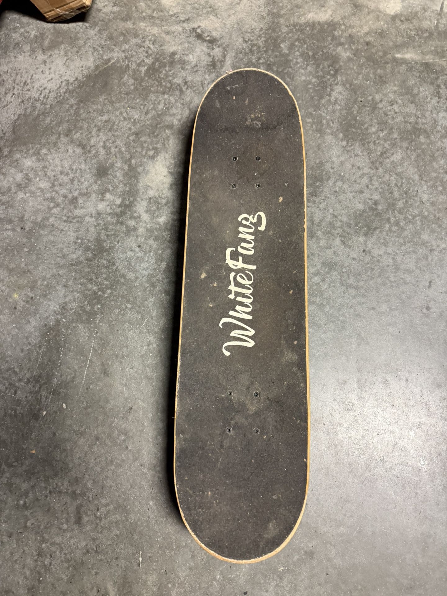 Skateboard. White Fang.