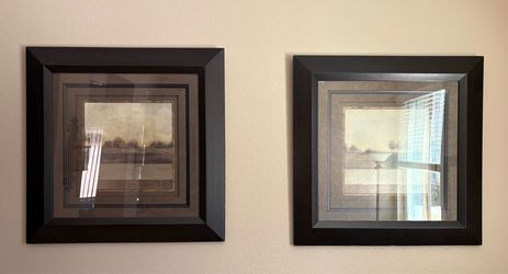 Two framed landscape prints double matted