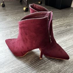 Burgundy high heel ankle boots with a zipper