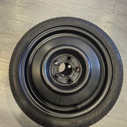Brand New - Temporary Donut Spare Tire  T115/70D14