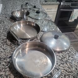 Pots and pans with various lids