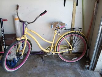 Huffy bike cranbrook yellow and pink