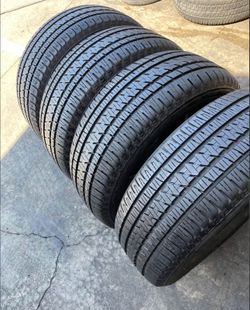 275 55 r20 BRIDGESTONE tires con 95% de Vida las 4