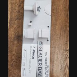 Brand New Sadira 3-Piece Bath Hardware Set with Towel Bar, Paper Holder, Towel Ring in Bronze . Price Is Firm. 