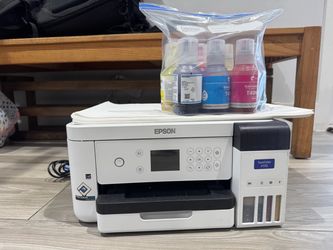 Sublimation printer with paper and ink