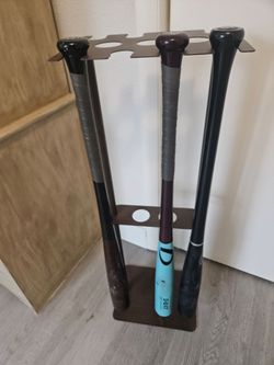 Pro model baseball bats with stand