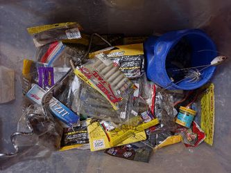 large bin of soft baits, power baits and weights
