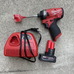 Milwaukee Impact And Charger