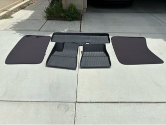 Tesla Model 3 floor mats and sun shades