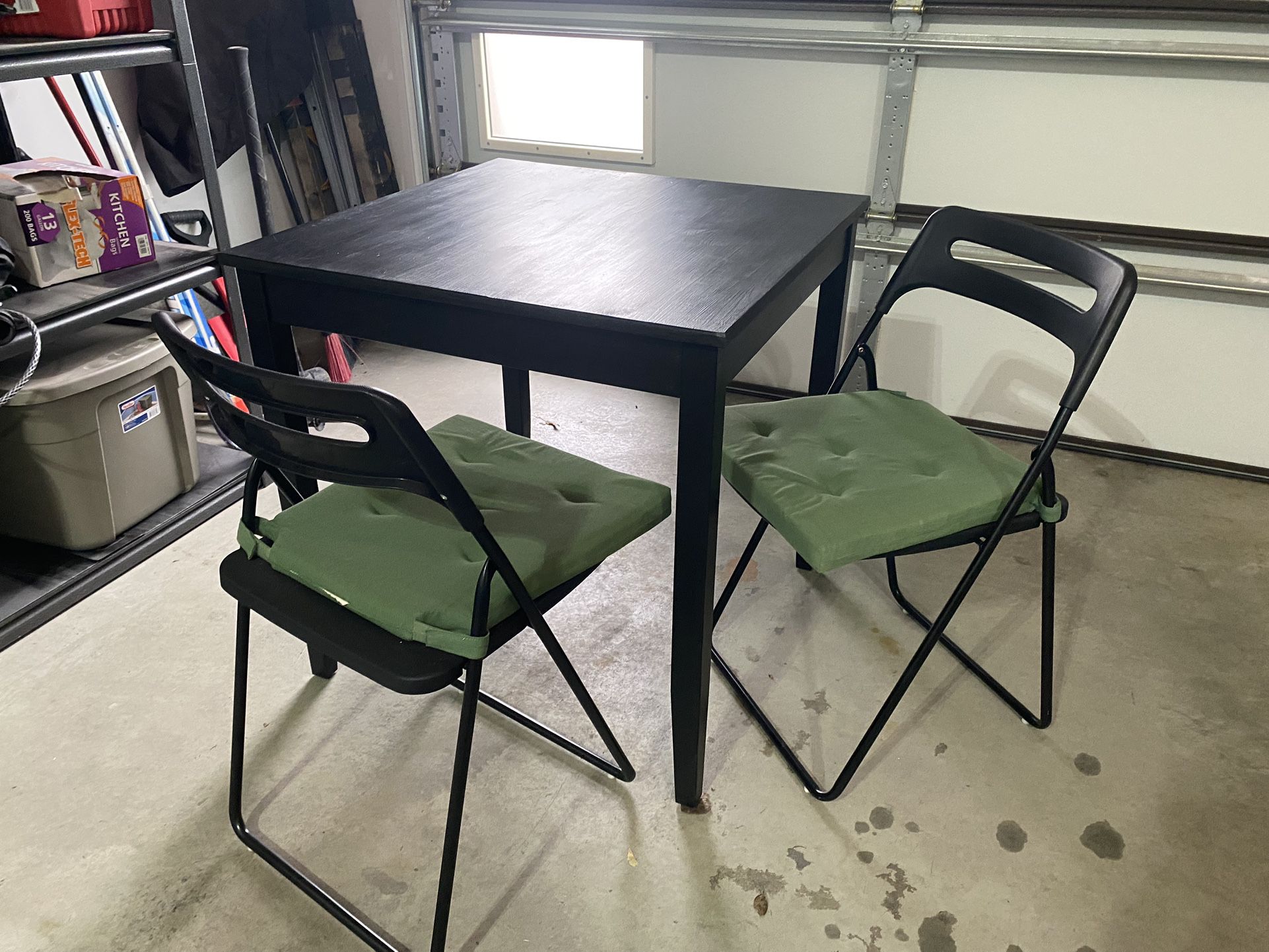 IKEA Table And Folding Chairs With Cushions 