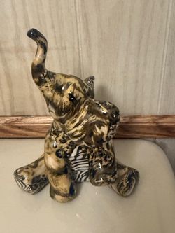 Elephant statues and candles available