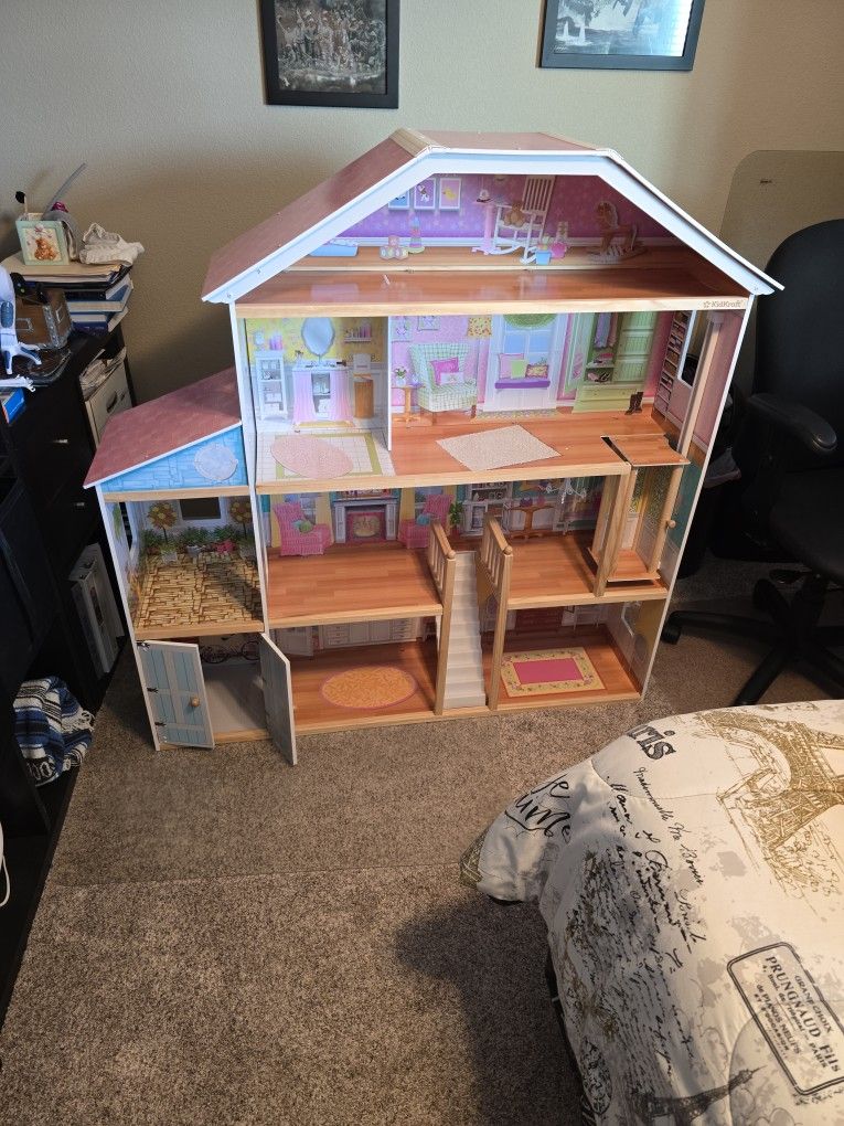 kidscraft doll house