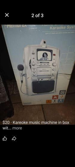 Kareoke music machine in box with microphone