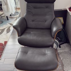 Leather Reclining Swivel Arm Chair With Adjustable Headrest & Ottoman