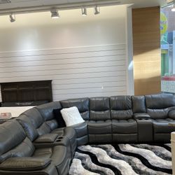 Summer clearance sale. Madrid, leather reclining sectional in gray or black only $1499. Easy finance option. Same day delivery.