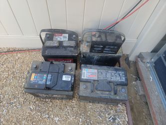 Lots of used car batteries
