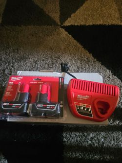 Milwaukee battery and  charger
