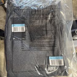 Grey Nike sweats