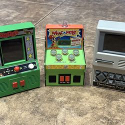 Handheld electronic arcade games Frogger Oregon Trail Whac-A-Mole