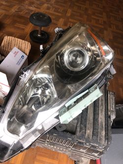 Driver headlight 2015 Nissan altima