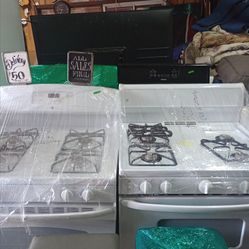 Black and white gas stoves four and five burners