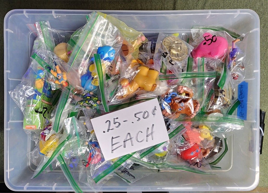 Bin Filled With Toys Figures .25 to .50 Cents Each
