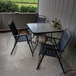 4-Person Black Patio Set – Table + 4 Chairs
