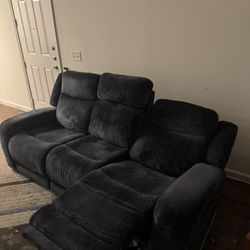 Blue Couch With Power Recline, USB, and 110v Plug Ins. Drink Holders. 