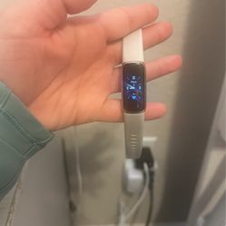 Fitbit luxe And Original Charger 