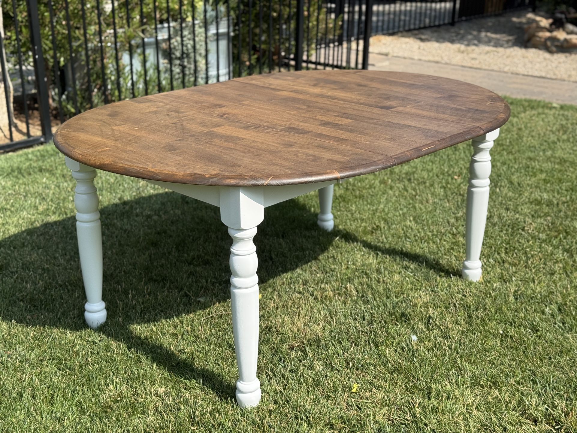 Round Oval Dining Table With Leaf