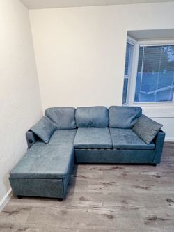Never Used Sofa Sectional Sleeper with Storage Chaise