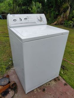 Very nice works excellent Whirlpool top load washer with all the hoses
