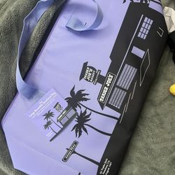 Large purple insulated Trader Joe’s bag