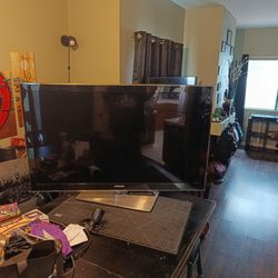 Samsung 55" 240hz tv with remote and table stand 