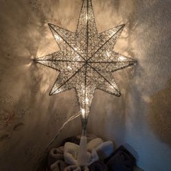 Eight point star, tree topper with white lights