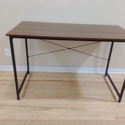 Table with sturdy metal frame, assembled