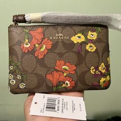 Coach Corner Zip Wristlet In Signature Canvas With Flower Print 
