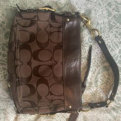 Brown Coach Purse With Purple Satin Inside