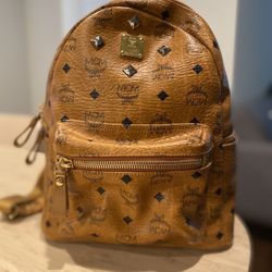 MCM Backpack / Monogrammed Studded Coated Canvas