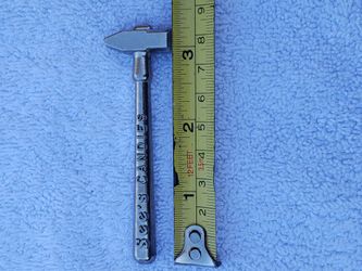 See's Candy advertising metal hammer