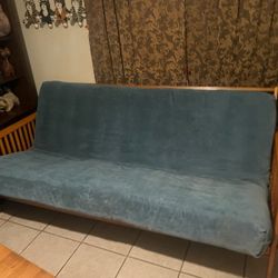 FUTON SOFA TURNS TO A BED