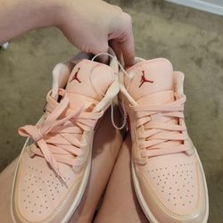 Woman's Air Jordan Pink And Red Low